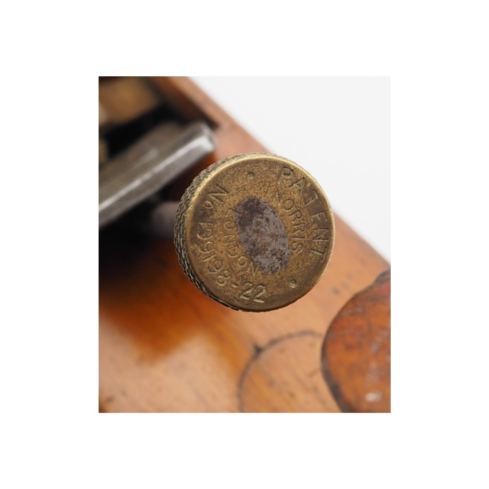 An antique wooden panel plane featuring a beech body, shaped rear handle, steel cutting iron, and brass adjustment mechanism. View VIII