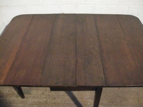 fig 1. ANTIQUE GEORGIAN OAK DROP LEAF PLANK TOP DINING TABLE C1780