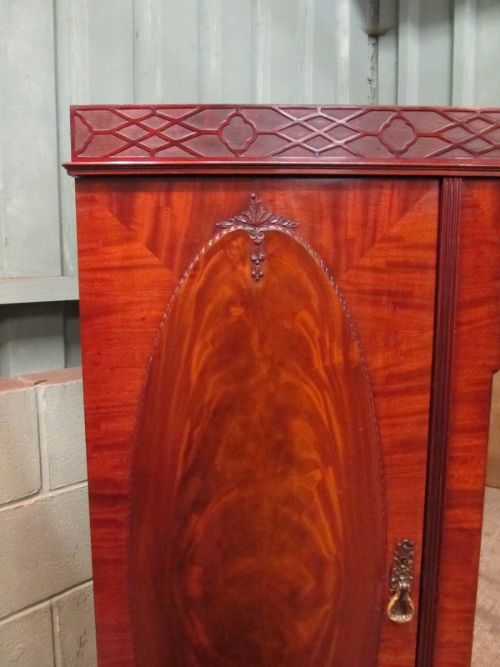 fig 1. ANTIQUE FLAMED MAHOGANY CHIPPENDALE TRIPLE WARDROBE BY MAPLES & CO C1910