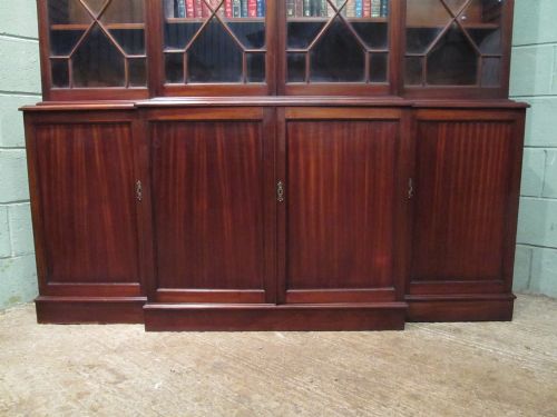 fig 1. ANTIQUE MAHOGANY ASTRAGAL GLAZED TRIPLE BREAKFRONT BOOKCASE C1920