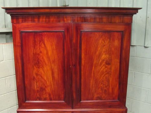 fig 2. ANTIQUE REGENCY FLAMED MAHOGANY LINEN PRESS C1820