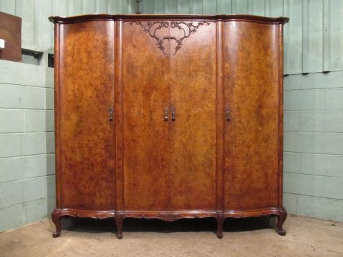 fig 1. ITALIAN BURR WALNUT SERPENTINE SHAPED TRIPLE WARDROBE C1920