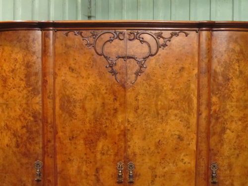 fig 2. ITALIAN BURR WALNUT SERPENTINE SHAPED TRIPLE WARDROBE C1920