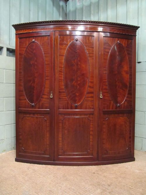 fig 1. ANTIQUE EDWARDIAN BOW FRONT FLAMED MAHOGANY TRIPLE WARDROBE C1900