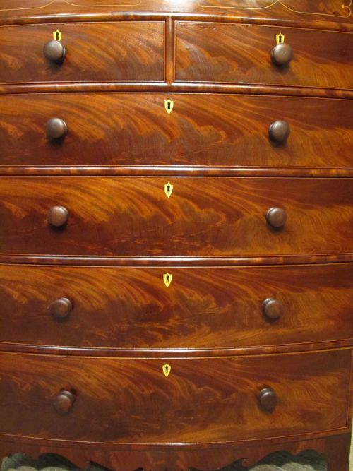 fig 1. REGENCY FLOAMED MAHOGANY BOW FRONT CHEST OF DRAWERS C1820