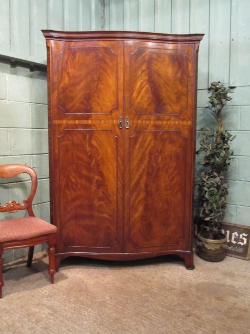 Antique Mahogany Serpentine Fronted Double Wardrobe by Waring & Gillow