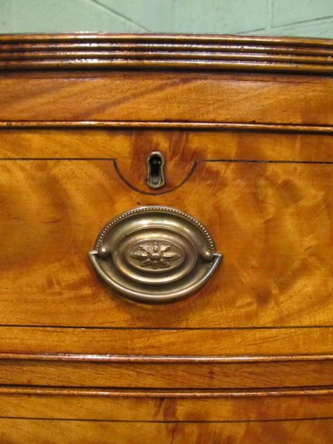 fig 2. Antique Regency Blonde Mahogany Bow front Chest of drawers c1820