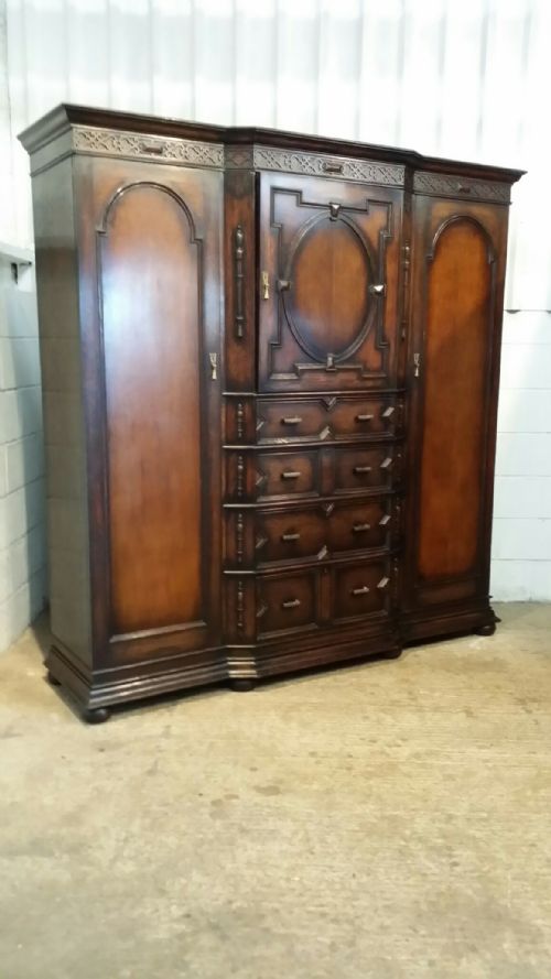 fig 2. ANTIQUE OAK TRIPLE BREAKFRONT WARDROBE BY MAPLE & CO C1910