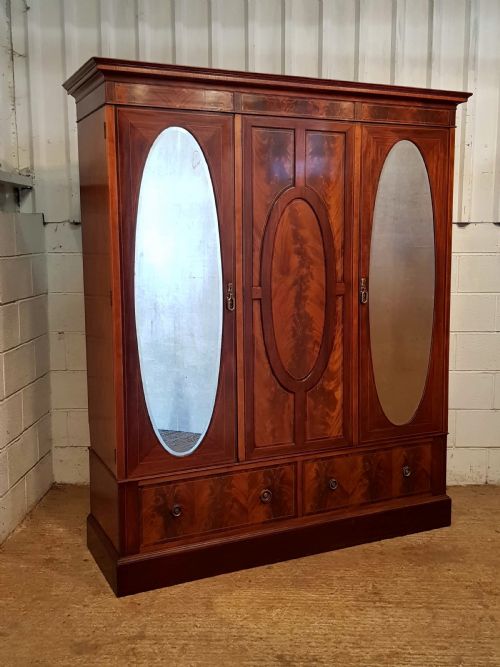fig 1. ANTIQUE EDWARDIAN FLAMED MAHOGANY TRIPLE WARDROBE C1900