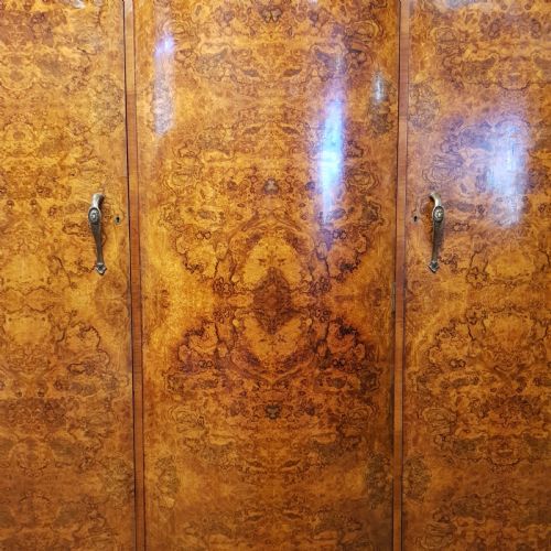 fig 1. ANTIQUE BURR WALNUT SERPENTINE SHAPED TRIPLE WARDROBE C1920