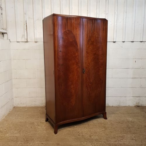 fig 1. ANTIQUE MAHOGANY SERPENTINE FRONT MAHOGANY DOUBLE WARDROBE C1920