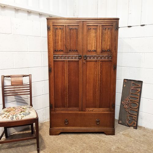 Antique Oak Linen Fold Tallboy C1920