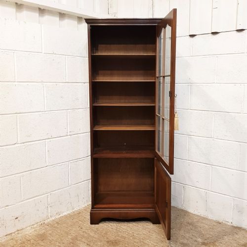 fig 1. ANTIQUE BURR WALNUT TALL NARROW GLAZED BOOKCASE C1920.