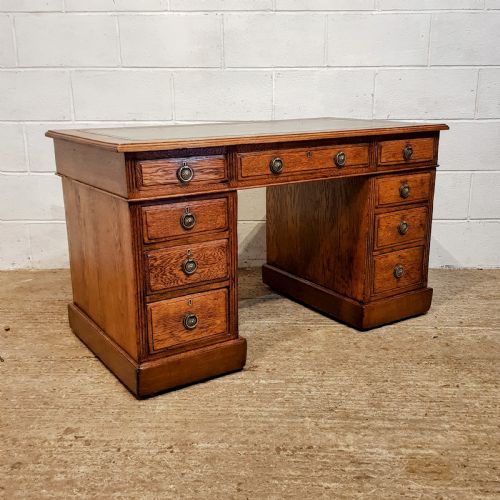 fig 1. AN ANTIQUE EDWARDIAN OAK TWIN PEDESTAL DESK