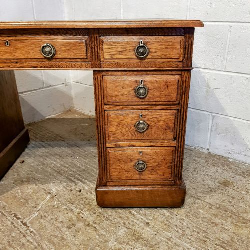 fig 2. AN ANTIQUE EDWARDIAN OAK TWIN PEDESTAL DESK