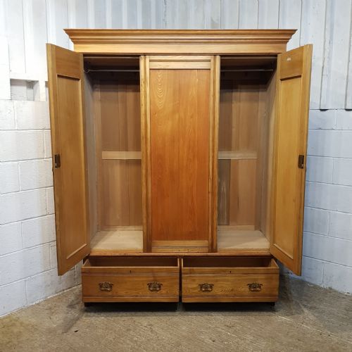 fig 1. AN ANTIQUE EDWARDIAN ASH DOUBLE WARDROBE C1900