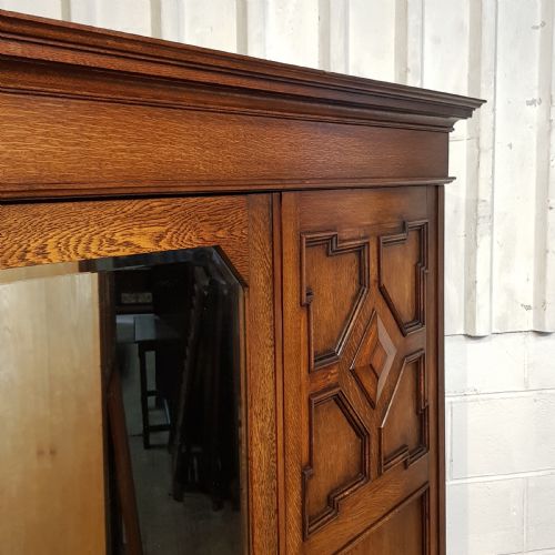 fig 1. AN ANTIQUE EDWARDIAN OAK TRIPLE WARDROBE C1910