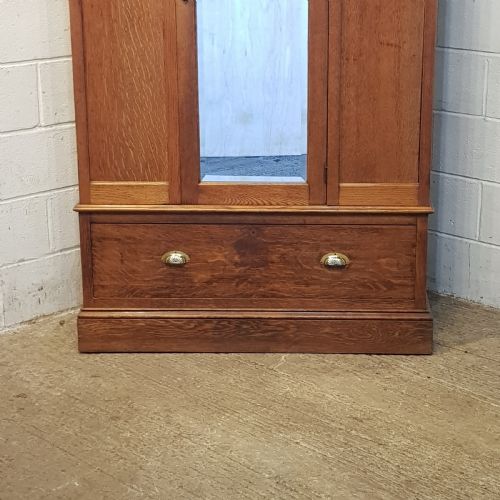 fig 1. AN ANTIQUE EDWARDIAN OAK SINGLE ARTS AND CRAFTS WARDROBE