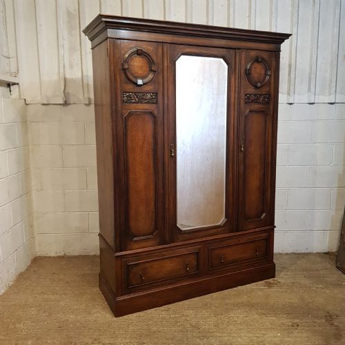 fig 2. AN ANTIQUE EDWARDIAN OAK TRIPLE WARDROBE C1900