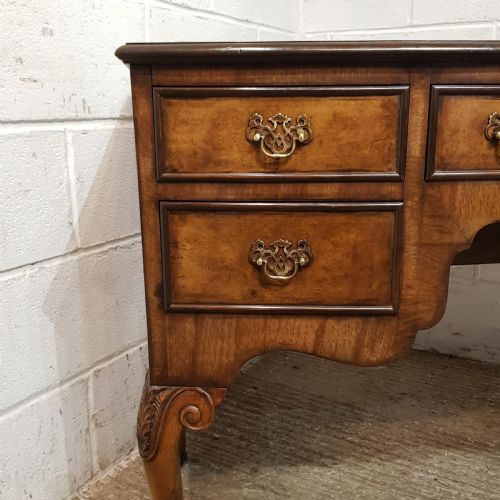 fig 1. AN ANTIQUE BOW FRONTED BURR WALNUT DRESSING TABLE C1920