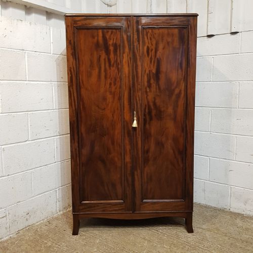 fig 2. A GEORGE 3rd SMALL MAHOGANY WARDROBE C1800