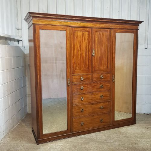 fig 1. AN EDWARDIAN MAHOGANY TRIPLE WARDROBE BY MAPLES C1900
