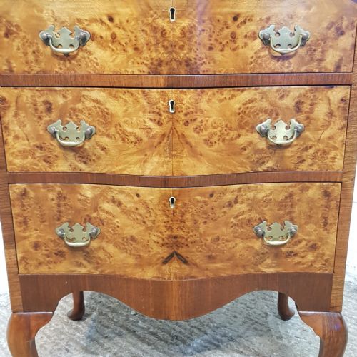 fig 2. A SMALL BURR WALNUT SERPENTINE FRONTED CHEST OF DRAWERS C1920