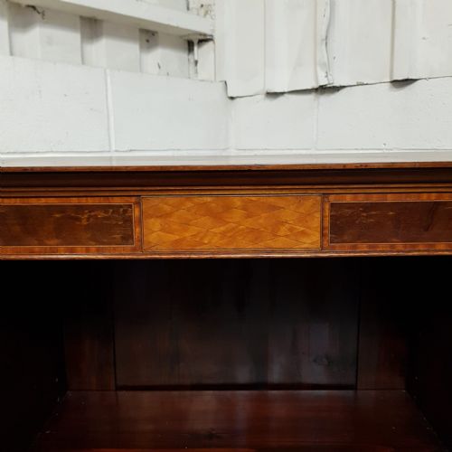 fig 2. AN EDWARDIAN MAHOGANY BREAKFRONT OPEN BOOKCASE C1890