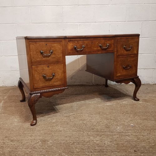 fig 1. A BURR WALNUT TWIN PEDESTAL DESK C1920
