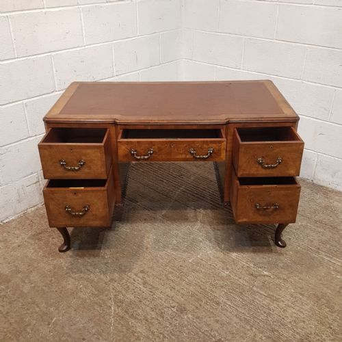 fig 2. A BURR WALNUT TWIN PEDESTAL DESK C1920