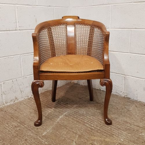 fig 1. AN EDWARDIAN BERGERE WALNUT FRAMED TUB CHAIR C1900