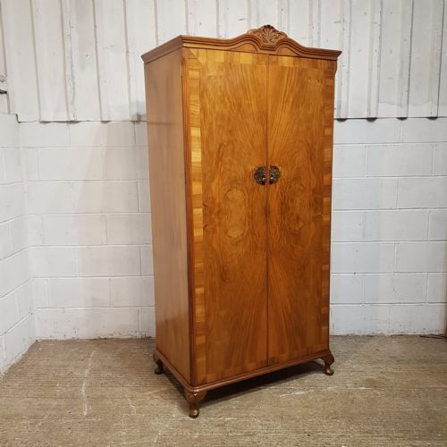 fig 1. A BURR WALNUT FITTED WARDROBE C1920