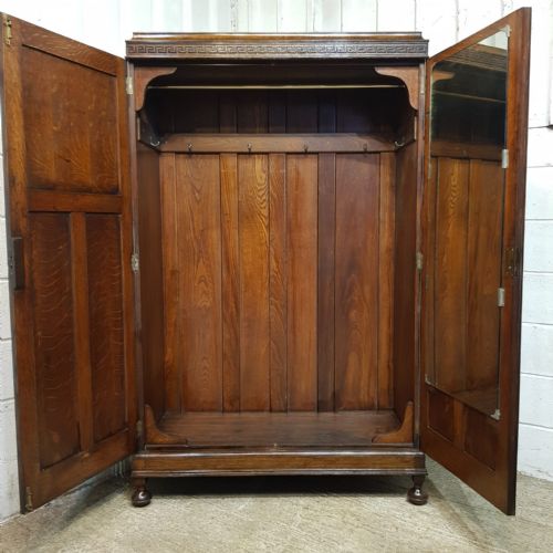 fig 1. AN ANTIQUE OAK DOUBLE WARDROBE C1920