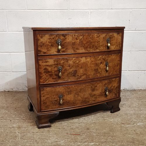 fig 1. A WALNUT BOW FRONTED 3 HEIGHT CHEST C1920