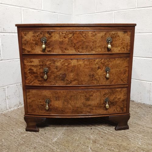 fig 2. A WALNUT BOW FRONTED 3 HEIGHT CHEST C1920