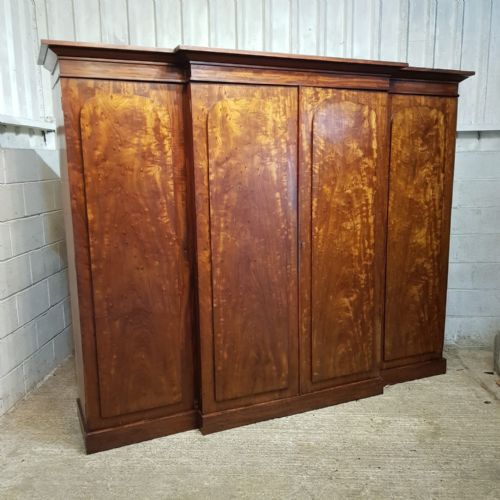 fig 1. A WILLIAM 4th FOUR DOOR MAHOGANY BREAKFRONT WARDROBE C1830