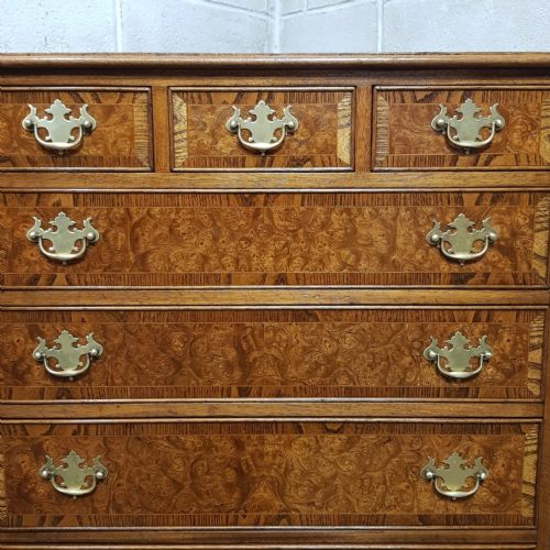 fig 1. A BURR WALNUT AND OAK CHEST OF DRAWERS C1920