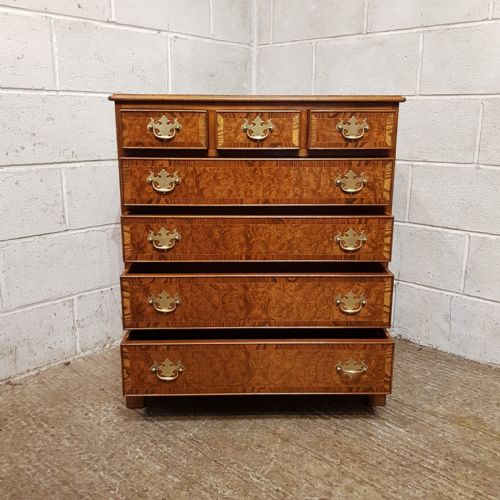 fig 2. A BURR WALNUT AND OAK CHEST OF DRAWERS C1920