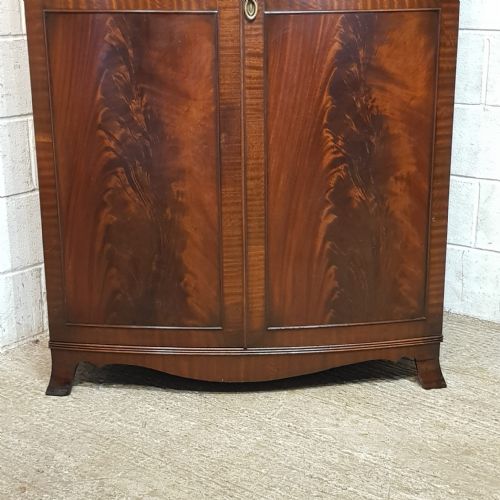 fig 2. A BOW FRONTED MAHOGANY TRIPLE WARDROBE C1920