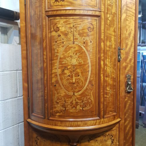 fig 2. A SATINWOOD HEAVILY INLAID TRIPLE WARDROBE BY SHAPLAND AND PETTER OF BARNSTABLE C1890