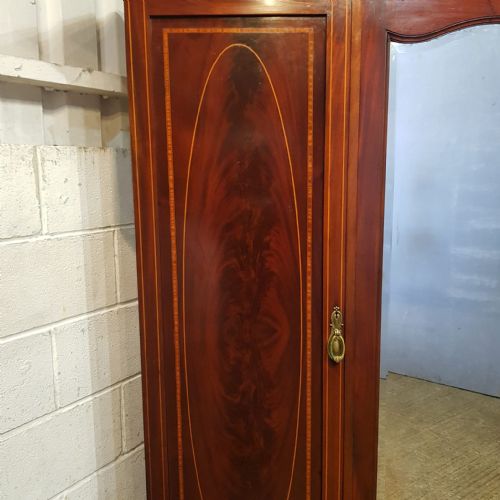 fig 1. AN EDWARDIAN MAHOGANY INLAID TRIPLE WARDROBE C1900