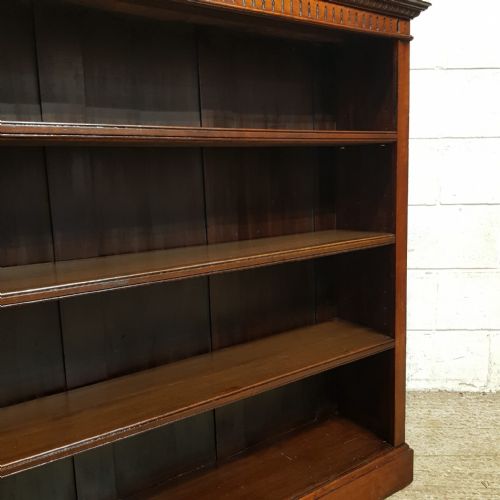 fig 1. A VICTORIAN WALNUT OPEN BOOKCASE C1880