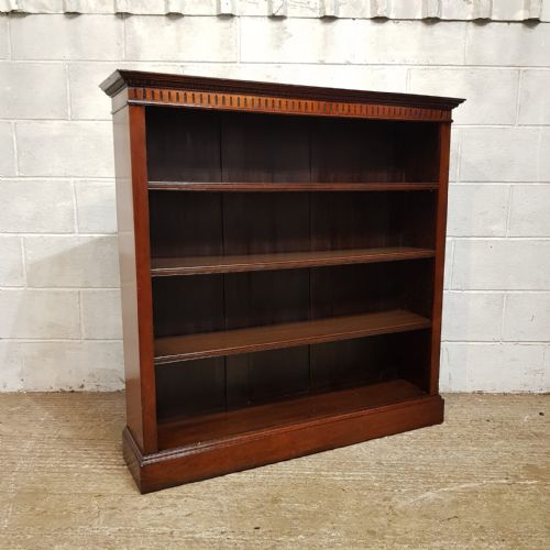 fig 2. A VICTORIAN WALNUT OPEN BOOKCASE C1880
