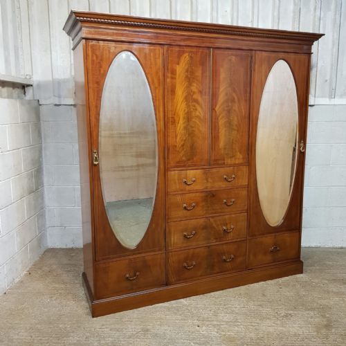 fig 1. AN EDWARDIAN MAHOGANY TRIPLE WARDROBE C1900