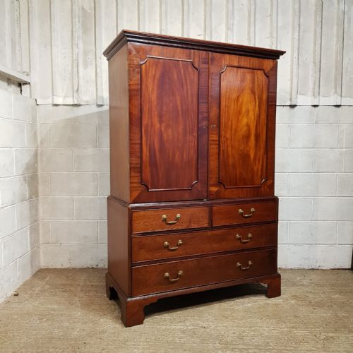 fig 1. A REGENCY MAHOGANY CLOTHES PRESS C1810