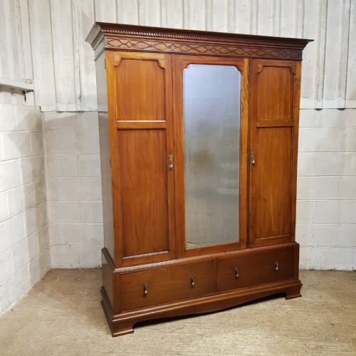 fig 2. A SMALL EDWARDIAN MAHOGANY TRIPLE WARDROBE C1900