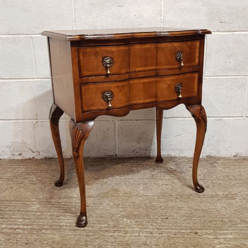 A SMALL BURR WALNUT EDWARDIAN SERPENTINE FRONTED SIDE TABLE C1900