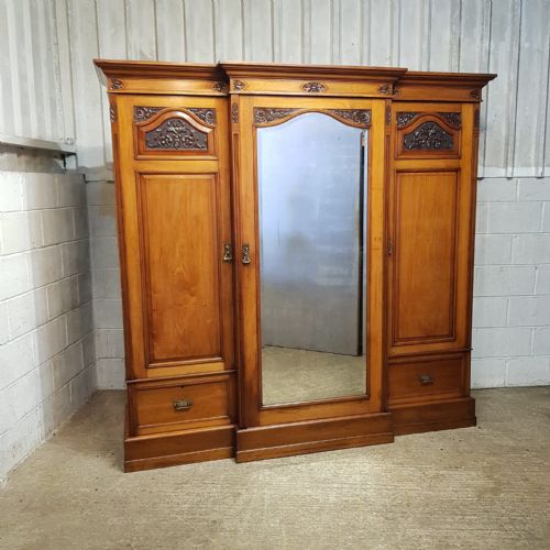fig 1. A LATE VICTORIAN WALNUT BREAKFRONT TRIPLE WARDROBE C1890