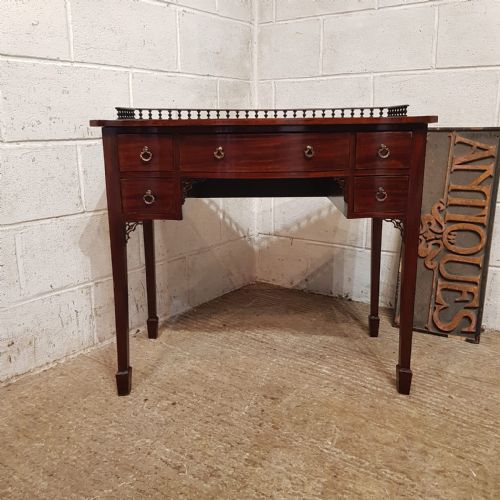 AN EDWARDIAN SERPENTINE FRONTED MAHOGANY WRITING TABLE C1900 - ADDITIONAL PHOTO 9