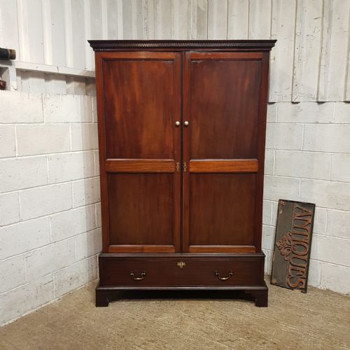 A GEORGE 3RD MAHOGANY DOUBLE WARDROBE C1810
